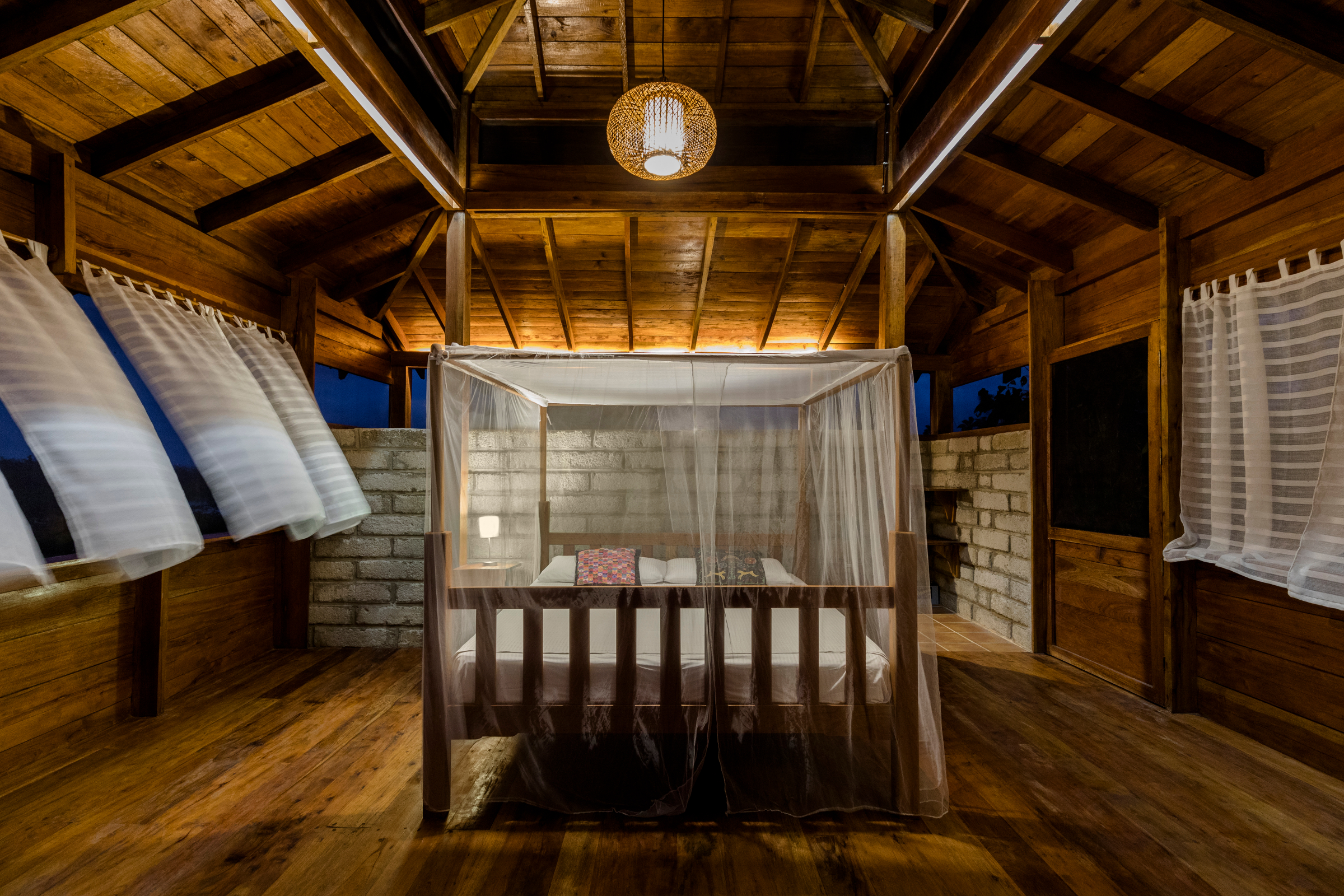 bed in Guacimo Lodge room